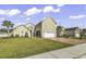 Two-story home with attached garage and manicured lawn at 217 Southern Breezes Circle, Murrells Inlet, SC 29576