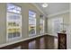 Bright living room with hardwood floors, large windows, and recessed lighting at 217 Southern Breezes Circle, Murrells Inlet, SC 29576