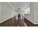 Open living area with hardwood floors and a fireplace at 217 Southern Breezes Circle, Murrells Inlet, SC 29576