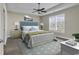 Main bedroom with ceiling fan, large windows and plenty of natural light at 217 Southern Breezes Circle, Murrells Inlet, SC 29576