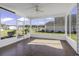 Relaxing screened porch overlooking backyard and community at 217 Southern Breezes Circle, Murrells Inlet, SC 29576