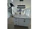 Spacious basement with an open floor plan, spiral staircase, and access to the pool at 37 Geney Ln., Pawleys Island, SC 29585