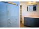 Modern bathroom features a glass door shower and a vanity with a marble countertop at 37 Geney Ln., Pawleys Island, SC 29585