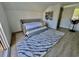 Bedroom has a trundle bed, interesting art pieces, and light-colored flooring at 37 Geney Ln., Pawleys Island, SC 29585