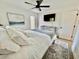 Bright bedroom with modern decor, ceiling fan, and a neutral color scheme at 37 Geney Ln., Pawleys Island, SC 29585