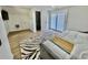 Bedroom with an ensuite bath and sliding glass doors with a zebra print rug at 37 Geney Ln., Pawleys Island, SC 29585