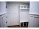 Bright entryway features white wainscoting and a built-in bench with storage cubbies at 37 Geney Ln., Pawleys Island, SC 29585