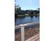 Scenic view of a serene pond surrounded by lush greenery from the wood deck at 37 Geney Ln., Pawleys Island, SC 29585