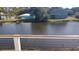 A relaxing pond view showcases a tranquil pond between two waterfront homes at 37 Geney Ln., Pawleys Island, SC 29585
