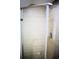 Modern shower with glass door, chrome fixtures, and light wood-look tile at 37 Geney Ln., Pawleys Island, SC 29585