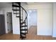Unique spiral staircase with adjacent living area and modern finishings at 37 Geney Ln., Pawleys Island, SC 29585