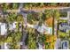 Aerial view of home showcasing pool, landscaping, and surrounding neighborhood at 3936 Murrells Inlet Rd., Murrells Inlet, SC 29576