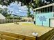 Large backyard featuring a pool, fire pit, and privacy fence, perfect for outdoor enjoyment at 3936 Murrells Inlet Rd., Murrells Inlet, SC 29576