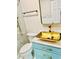 Modern bathroom featuring shower, toilet, vanity with sleek gold accents at 3936 Murrells Inlet Rd., Murrells Inlet, SC 29576