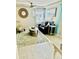 Cozy living room with ceiling fan, stylish rug, comfortable seating, and ample natural light at 3936 Murrells Inlet Rd., Murrells Inlet, SC 29576
