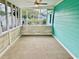 Enjoy this screened porch with a peaceful setting, and walls painted with a refreshing color at 3936 Murrells Inlet Rd., Murrells Inlet, SC 29576