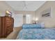 This bedroom features twin beds, an ensuite bathroom, closet, and dresser for storage and convenience at 4879 Dahlia Ct. # 204, Myrtle Beach, SC 29577