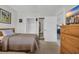 Bright bedroom with television featuring a walk-in closet and ensuite bathroom at 4879 Dahlia Ct. # 204, Myrtle Beach, SC 29577