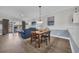 Open living space with dining area, and access to the balcony at 4879 Dahlia Ct. # 204, Myrtle Beach, SC 29577
