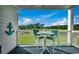 Relaxing patio with seating overlooks the beautiful landscape and serene outdoor views at 4879 Dahlia Ct. # 204, Myrtle Beach, SC 29577