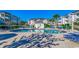 Community pool area with lounge chairs and a cabana for relaxing at 4879 Dahlia Ct. # 204, Myrtle Beach, SC 29577