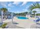 Inviting community pool with lounge chairs and well-maintained landscaping at 4879 Dahlia Ct. # 204, Myrtle Beach, SC 29577