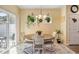 Bright dining area with sliding door access to the outdoor patio and backyard at 263 Red Maple Loop, Longs, SC 29568