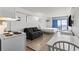 Open concept living space features a kitchenette, bed, sofa, and ocean view at 1205 S Ocean Blvd. # 20702, Myrtle Beach, SC 29577