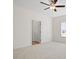 Bedroom featuring neutral carpet, ceiling fan, and natural light at 299 Hayloft Circle, Conway, SC 29526