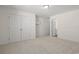 Spacious bedroom featuring carpet, closet, and an ensuite bathroom at 299 Hayloft Circle, Conway, SC 29526