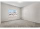 Clean and bright bedroom featuring neutral carpet and a window with a view at 299 Hayloft Circle, Conway, SC 29526
