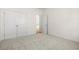 Bedroom with carpet, closet, and view to kitchen at 299 Hayloft Circle, Conway, SC 29526