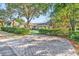 Brick paved driveway leading to a charming house with manicured landscaping at 719 Mount Gilead Rd., Murrells Inlet, SC 29576