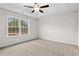 Spacious bedroom with carpeted floor and ceiling fan at 902 Owls Nest Dr., Conway, SC 29527