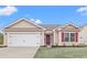 Newly constructed house with a two-car garage and a manicured lawn at 902 Owls Nest Dr., Conway, SC 29527