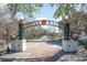 Entrance to Riverwalk, featuring a brick path and ornate archway at 902 Owls Nest Dr., Conway, SC 29527