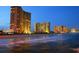 Luxury oceanfront high-rise condos illuminated at night at 175 Saint Clears Way # 23-I, Myrtle Beach, SC 29572