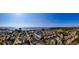 Panoramic aerial view of condo community on a lake, surrounded by scenic views and close to the beach at 1919 Spring St. # B-16, North Myrtle Beach, SC 29582