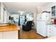 A spacious living room is accessible from the kitchen, providing an open living area at 1919 Spring St. # B-16, North Myrtle Beach, SC 29582