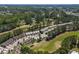 The aerial showcases a community adjacent to a golf course, complete with lush greenery and pristine landscaping at 2169 Wedgewood Dr., Longs, SC 29568