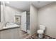 Bathroom with double vanity, toilet, and shower at 218 Eva Dr., Loris, SC 29569