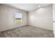 Simple bedroom with carpeted floor and window at 218 Eva Dr., Loris, SC 29569
