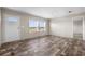 Living Room with wood-look floors and view to exterior at 220 Eva Dr., Loris, SC 29569