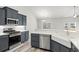 Modern kitchen with stainless steel appliances and a farmhouse sink at 307 Hayloft Circle, Conway, SC 29526