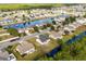 Aerial view of houses by water featuring fountains, lush greenery and mature trees at 4659 East Walkerton Rd., Myrtle Beach, SC 29579