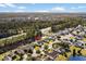 Aerial view of a neighborhood featuring mature trees, waterways, and proximity to green spaces at 4659 East Walkerton Rd., Myrtle Beach, SC 29579