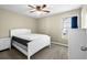 Comfortable bedroom with a white bed frame and a bright window at 4659 East Walkerton Rd., Myrtle Beach, SC 29579