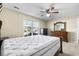 Bedroom with a plush mattress, ceiling fan, and natural light at 4659 East Walkerton Rd., Myrtle Beach, SC 29579