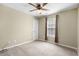 Bedroom with neutral walls, carpet, ceiling fan and a large window at 4659 East Walkerton Rd., Myrtle Beach, SC 29579