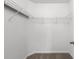 Walk-in closet with white wire shelving and neutral carpet flooring at 4659 East Walkerton Rd., Myrtle Beach, SC 29579